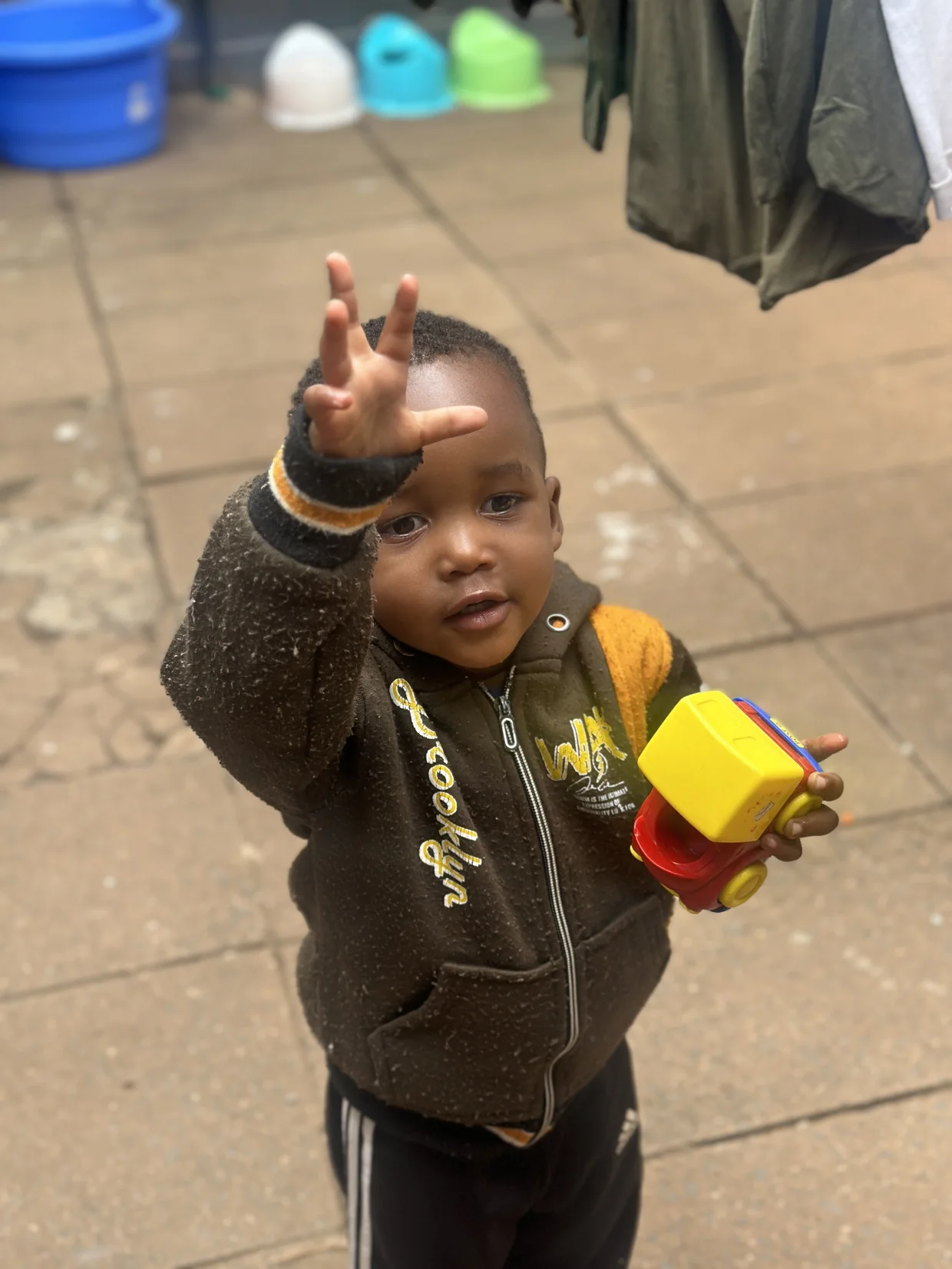 A spontaneous moment with a child at Little Heaven